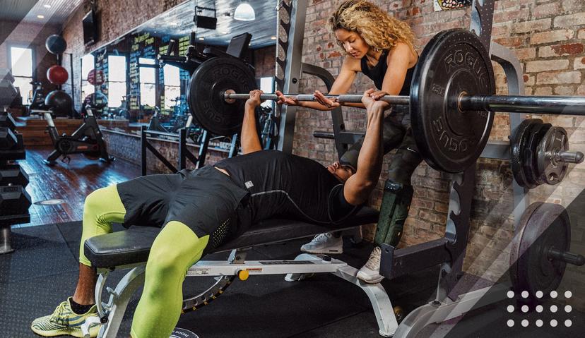 Spotting a client on bench press